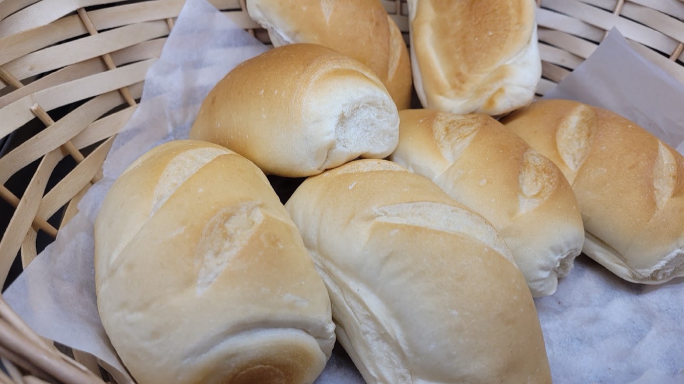 Fresh Brazilian bread rolls in a basket